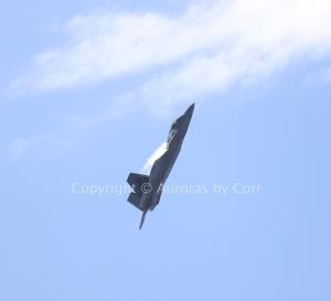 F-22 Raptor Climbing into the Skies with Vapour - Photographic Print - Matted